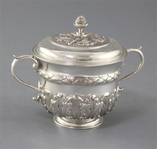 A George V 18th century style silver porringer and cover by Thomas of New Bond Street, 10 oz.